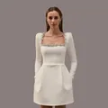 Detailed view of white long-sleeve dress featuring a rhinestone-embellished square neckline - S / French Rhinestone Dress (39147) / White