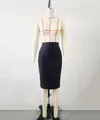 Detailed view of black elastic bandage pencil skirt on a professional tailor mannequin - S / Black