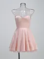 Primer plano de minivestido de satén rosa con tirantes y bajo de malla - XS / Tops / Rosa