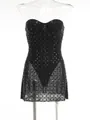 Close-up of black strapless mini dress with heavy rhinestone embellishments and sheer hem - XS / Top And Bottom / Black