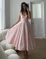 Elegant pink spaghetti strap midi dress featuring a structured bodice and a large flared skirt - XS / Tops / Pink