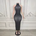 Detail of luxury black halter neck dress with sparkling rhinestones and beaded chains - S / Top And Bottom / Black
