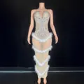 Luxurious nude bodycon dress featuring silver rhinestones and white feather trim - S / Silver