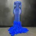 Exquisite blue mermaid evening gown featuring dense rhinestones and feather hem detail. - S / Blue