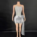 Detailed view of silver metallic strapless dress featuring rhinestone fringe and side flower - S / Silver