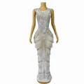 Close-up of luxury white mermaid dress with intricate silver sequins and fringe - S / Tops / Silver