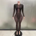 Close-up of sparkling black rhinestone mesh dress with elegant slit detail - S / Top And Bottom / Black