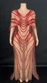 Detailed view of red sequin patterns on an elegant nude mesh cape design formal gown - S / Top And Bottom / Red