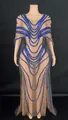 Close-up of intricate blue sequined patterns on an elegant sheer mesh gown with a cape - S / Top And Bottom / Blue