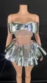 Close-up detail of silver mirror stage outfit with rhinestones for nightclub performance. - S / Top And Bottom / Silver
