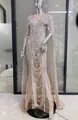 Detailed view of the intricate rhinestone beading on the sheer mesh banquet dress. - S / Top And Bottom / Silver