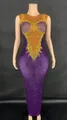Close-up view of elegant purple evening gown featuring intricate gold rhinestone patterns. - S / Top And Bottom / Purple