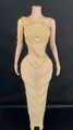 Detailed view of nude mesh two-piece set with gold rhinestones and chain fringe decor - S / Top And Bottom / Yellow Zircon