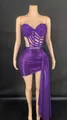 Detailed view of purple rhinestone corset top and ruched mini skirt set on mannequin. - S / Top And Bottom / Dark Violet