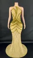 Detailed view of a gold one-shoulder sequin floor-length evening dress with lattice pattern - S / Bottoms / Yellow