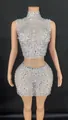 Stunning sleeveless high neck rhinestone crop top and matching bodycon mini skirt set - White