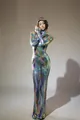 Full-length detail of a shimmering rainbow sequin hooded dress on a fashion model - S / Top And Bottom / Colorful