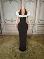 Elegant black halter evening gown featuring white feather off-shoulder trim and sequins - S / Tops / Black With White Flower