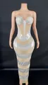 Elegant silver evening gown featuring sheer mesh panels and sparkling rhinestone stripe detailing - White