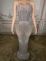Close-up view of a luxury silver rhinestone embellished evening gown on a mannequin - S / Top And Bottom / Silver