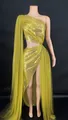 Detailed view of a gold one-shoulder sequin evening gown with high slit and cutout - S / Top And Bottom / Gold