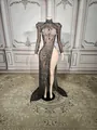 Elegant black evening gown with shimmering sequins, rhinestones and sexy high slit detail. - S / Black