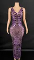 Elegant front view of a purple sequined bodycon evening dress on a mannequin stand. - Purple
