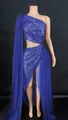 Detail of blue sequined one-shoulder evening gown with cut-out waist and side split. - Blue