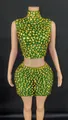 Sparkling green two-piece skirt set with gold rhinestones on sleeveless crop top - Verdant
