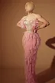 Detail shot of French pink ruffled mesh dress with sequined bodice and mermaid silhouette - S / Pink