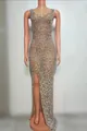 Full view of elegant nude floor-length evening dress with sparkling silver rhinestones and slit - S / Top And Bottom / Silver