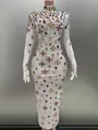 Detail of white bodycon dress with colorful rhinestone clovers and fringe gloves - XS / Bottoms / White