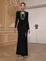 Elegant black long-sleeved bandage evening gown with heavy silver beading and high slit. - S / Top And Bottom / Black