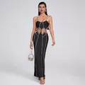 Elegante abito lungo bandage nero con linee verticali di strass e sexy ritagli in vita - Taglia S / Pantaloni e gonne / Nero