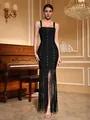 Elegant black bandage evening gown featuring sparkling rhinestones and long tassel fringe detail - S / Top And Bottom / Black