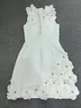Detailed view of exquisite 3D floral appliqués and crystal beads on white bandage dress - S / Dresses / White