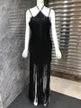 Elegant black halter neck evening dress featuring floor-length fringe tassels on a mannequin - S / Top And Bottom / Black