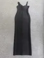 Detailed view of black bandage bodycon maxi dress with cross strap neckline. - M / Black