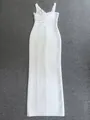 Detailed flat lay of a floor-length white bandage dress with criss-cross neckline - L / White