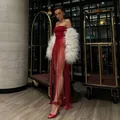 Elegant red strapless jumpsuit with long fringe detail for party and performance wear - XS / Top And Bottom / Red