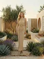 Full body view of high neck beige maxi dress in a scenic outdoor garden setting - S / Tops / Apricot