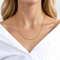 925 sterling silver gold-plated water wave chain necklace on model, 45cm length and 1.5mm thick - Water Wave Chain / 45cm Length / 1.5mm Thickness