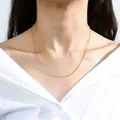 925 sterling silver gold-plated water wave chain necklace on model, 45cm length and 1.5mm thick - Water Wave Chain / 45cm Length / 1.5mm Thickness