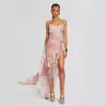 Full-length view of a floral print camisole dress featuring a high-low ruffled hem and slit - S / Tops / Pink Floral