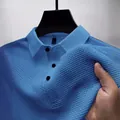 Close-up of blue ice silk quick-dry polo shirt showing textured fabric and stretch - Blue