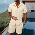 Lifestyle shot of a men's beige two-piece outfit with textured fabric in a summer setting - Apricot