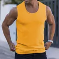 Close-up detail of yellow ribbed slim fit performance gym tank top for active men - Yellow