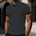 Primer plano de polo gris marengo con detalle de tejido de seda de hielo muy transpirable - S / Tops / Gris
