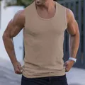 Close-up of men's khaki ribbed fitness tank top showing elastic slim fit texture - Khaki
