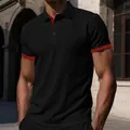 Detalle del polo negro para hombre con ribete rojo y tejido texturizado. - S / Tops / Negro